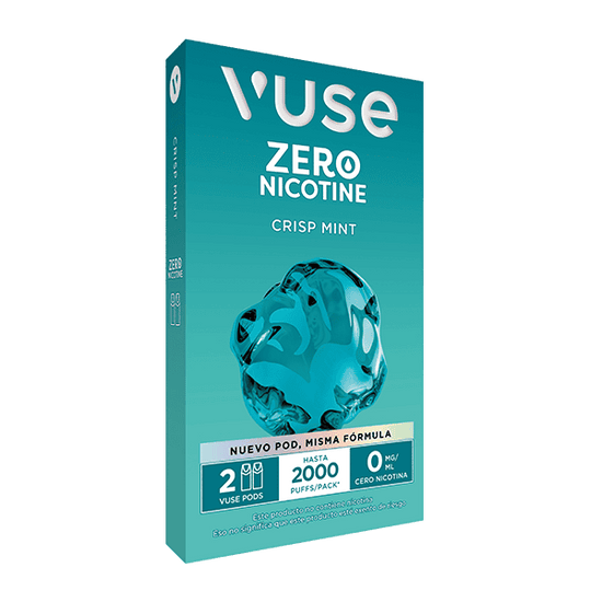 El envase de Vuse Pods Turquesa - Menta presenta un gran cristal de menta, el nombre del producto y detalles en inglés y español, destacando 2 pods por caja, hasta 2000 caladas y 0 mg de nicotina. Marca: Vuse.